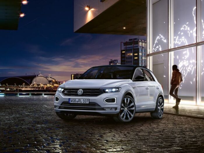 TCR0196 T Roc with R Line exterior in front of illuminated building 3 2 f cc 5