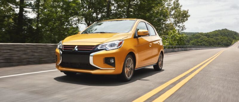 2022 mitsubishi mirage front angled profile sand yellow metallic 2